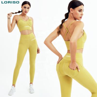 China 2021 Antibacterial Women's Back Pocket 2 Piece Tight Workout Two Piece Yoga Set Yoga Pants And Bra Set for sale