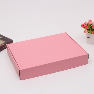 China Recycled Materials Corrugated Pink Die Cut Packaging Shipping Shipping Box Cardboard Box Custom Logo for sale