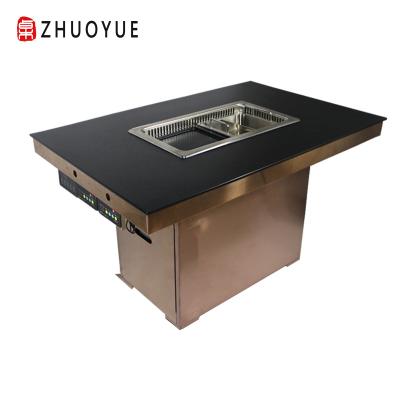 China Modern Commercial Restaurant Smokeless Korean BBQ Grill With Hotpot Built In Dining Table for sale