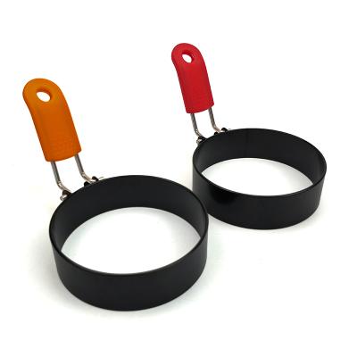 China Viable non-stick coatng circle egg ring egg omelte tools with silicone handle for sale