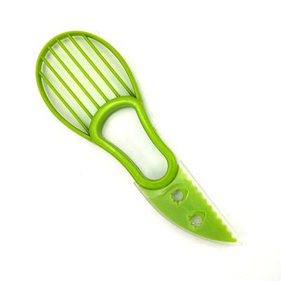 China Viable 3 In 1 Multifunctional Green Plastic Avocado Vegetable Cutter Fruit Cutter Slicer Tools for sale