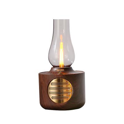 China Retro High quality gift retro kerosene led table lamp outdoor camping waterproof bluetooth speaker for sale