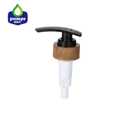 China Non Puddle Lotion Pump Flame Plating Dispenser Wood High Quality Pump For Shampoo Conditioner Soap Spa for sale