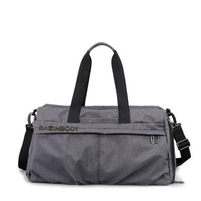 China Mazinbody New Design Large Vintage Polyester Mens High Capacity Sports Gym Foldable Duffel Bag Traveling Luggage for sale