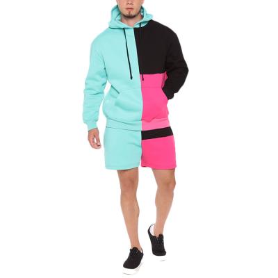 China Anti-wrinkle fashion patchwork color block shorts and hoodie jogger set men pullover hoodies 100% cotton for sale