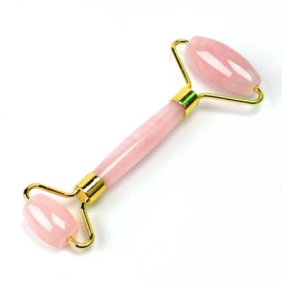 China Natural Handmade Quartz Jade Facial Roller 100% Rose Quartz Stone Rose Massager for Face for sale