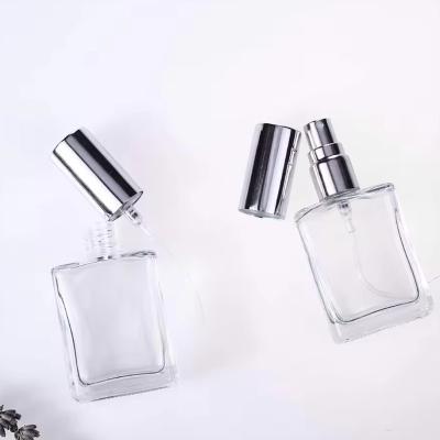 China Cosmetic 30ml 50ml 100ml Square Glass Fine Mist Spray Bottle For Essential Oil Perfume Pump Sprayer for sale