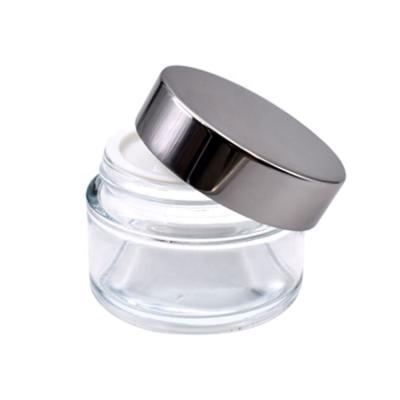 China 50g Empty Cosmetic Glass Jar Skin Care Cream Jar Wholesale for sale