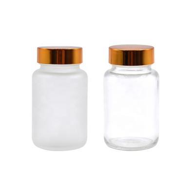 China Wholesale Clear Eco-friendly Frosted Empty Glass Medicine Pill Bottles 100ml Pharmaceutical Pill Bottle With Cap for sale