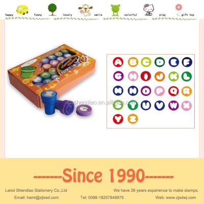 China Eco-friendly Plastic Stamps Set Round Alphabet Stamps With Ink Flower Stamps In PVC Box for sale