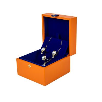 China Direct Selling PU+Plush Durable PU Material Orange Flash Jewelry Box Dustproof Jewelry Gift Box for sale