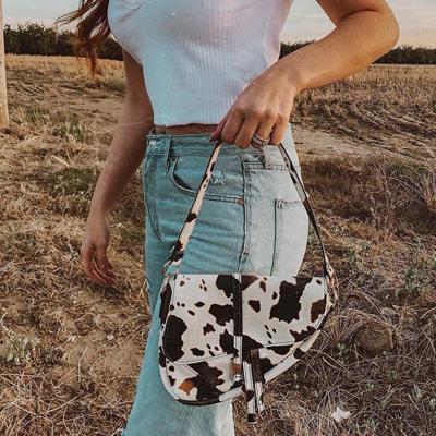 China Classic Fashion Personality Women's Handbags All-match Cash Cow Print Armpit Bag for sale