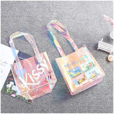 China Fashion Simplicity PVC Tote Bag Custom Fashion Transparent Laser Storage Waterproof Shopping Bag for sale