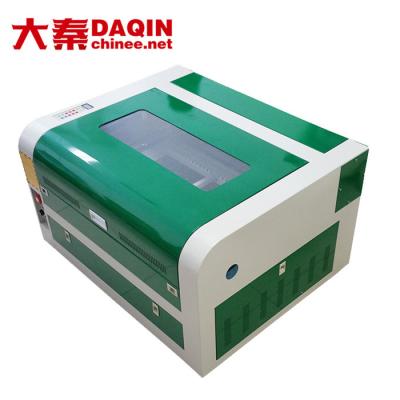 Κίνα Υψηλής ακρίβειας 6040 4060 CO2 Laser Cutting Machine Desktop 40W 50W 60W 80W Engraver Cutter για ερασιτέχνες και εργοστάσια προς πώληση