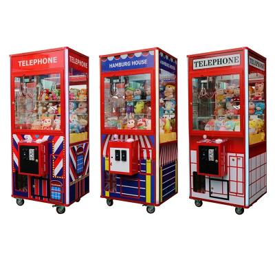 China Automatic British Style Doll Clip Claw Clip Doll Machine Electric Arcade Claw Machine for sale