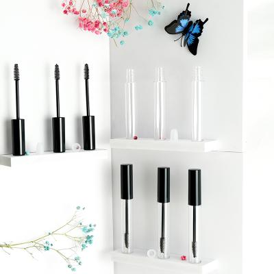 China J101 Cosmetics in stock 12ml custom tube for wand empty clear clear tube mascara mascara cosmetic packaging with eyelash brush and black lid for sale