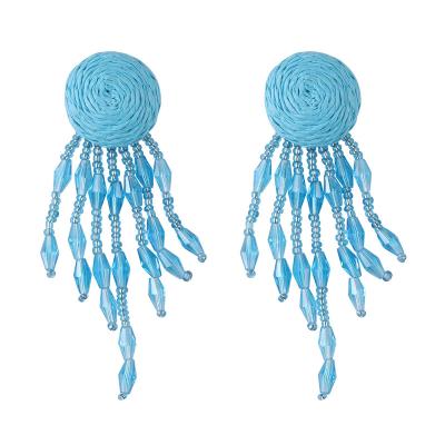 China BOHEMIA Suppliers New Design Fashion Earrings Hand Woven Button Long Crystal Tassel Earrings for sale