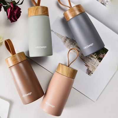 China Sustainable High Quality Sports Stainless Steel Bottle Silicone Cup With Handle for sale