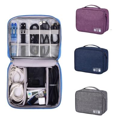 China ENGLAND STYLE Travel Data Cable Organizer Electronics Accessories Carry Bag Oxford Digital Cable Storage Bags for sale