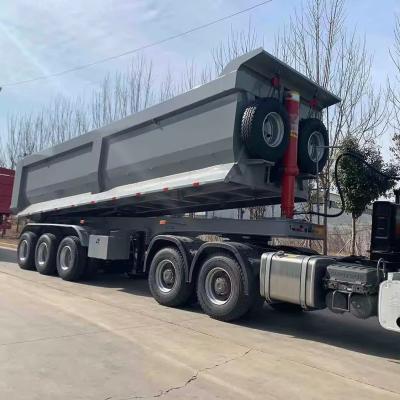 China 9300*2500*3400mm Tandem Axle Bogie Suspensión de extremo de inclinación Semirremolque 32m3 con piezas en venta