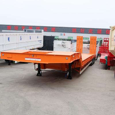 China 12 banden laagbed vrachtwagen half-aanhanger voor graafmachine transport hydraulische oprit Te koop