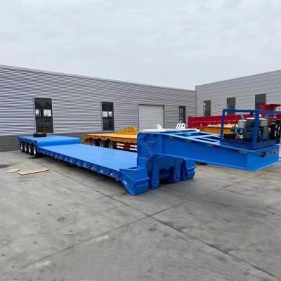 China 80ton 3 Axles Lowbed Semi Truck Trailer Steel 3 Axle Low Bed Semi Trailer 28 Ton for sale