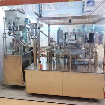 China High speed automatic doypack pouch food 5 spout juice spout jelly filling capping machine for sale