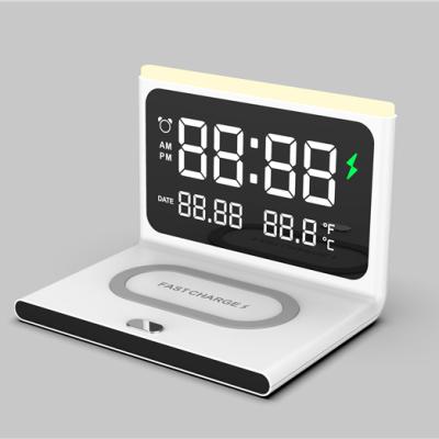 China Multi Function Mobile Phone Calendar Alarm Clock Phone Chargers 15W Wireless Charger 3 In One for sale