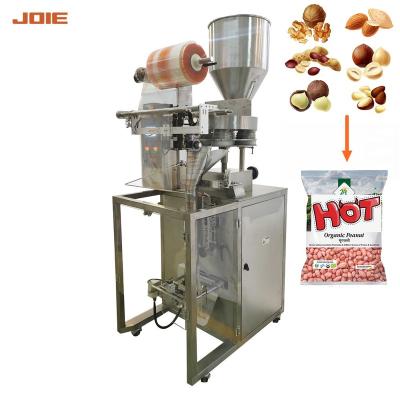 China Food Automatically Filling And Sealing Vertical Packing Machine For Chocolate Beans Cup Measuring for sale