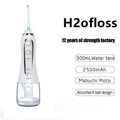 China Agua ultrasónica recargable Flosser de la prenda impermeable sin cuerda para el hogar y el viaje en venta