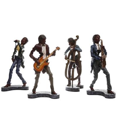 China Custom Europe Polyresin Music Characters Band Collectable Bassist/Guitar/Trumpet/Violin Figurines Statues for sale