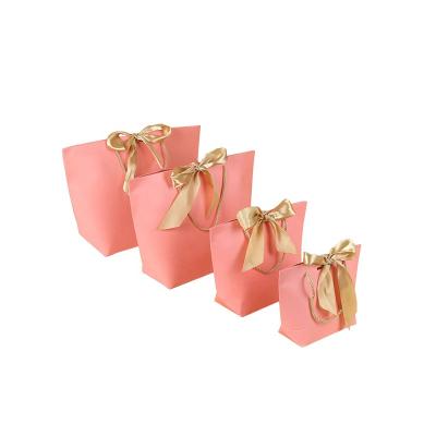 China Recycled Materials Personalization Pink Paper Bag Gift Bags For Wedding for sale