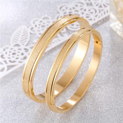 China Color Not Fade Gold Bangle Rose Gold Plated Dubai Design Men Women Stainless Steel Couples Jewelry Bracelet for sale