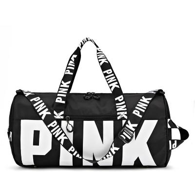 China Custom JONLON Custom Color Handbag Pink Duffel Bag Travel Nylon Bag With Custom Letter Patches for sale