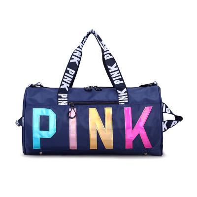 China 2021 Designer Custom Logo Pink Tote Duffle Bag Polyester Travel Gym Waterproof Trendy Bags For Women's Gym Bag for sale