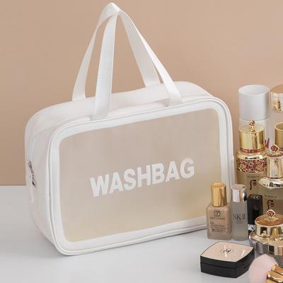 China JANLON Women Water Resistant and Tear Resistant Clear Makeup Organizer Pouches Tote Travel Toiletry Bags Transparent PVC Cosmetic Bag for sale