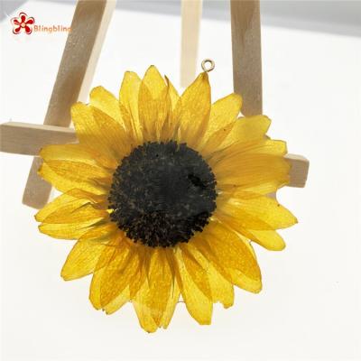 China Romantic Factory Direct Pressed Dry Flower Charms Sunflower Enamel Pendant Charms for sale