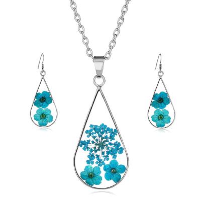 China FASHIONABLE Dried Resin Double Delicacy Flower Necklace Set Blue Pendant Jewelry Woman Dry Transparent Earring for sale