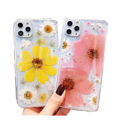 China Resin+real dried flower resin flower resin yellow daisy personalized rose real pressed soft flower phone case for sale