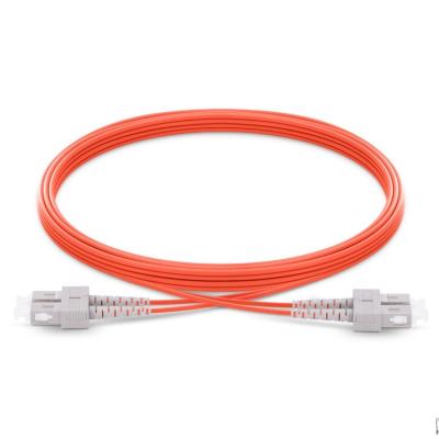 China FTTH System Manufacturer FTTH Sc 50/125 Jumper Cable Fiber Optic Patch Multimode Orange Duplex Fiber Optic Cord for sale