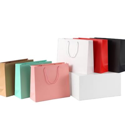 China Recyclable Black Pink White Paper Gift Bags With Handle Recyclable Paper Packaging Bags Custom Clothing Shoe Shopping Paper Bag With Logo for sale