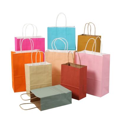 China Wholesale Recycled Brown Paper Bags Recyclable Stain Clothing Shoe Gift Shopping Bags Food Kraft Paper Package Custom Logo With Handles for sale