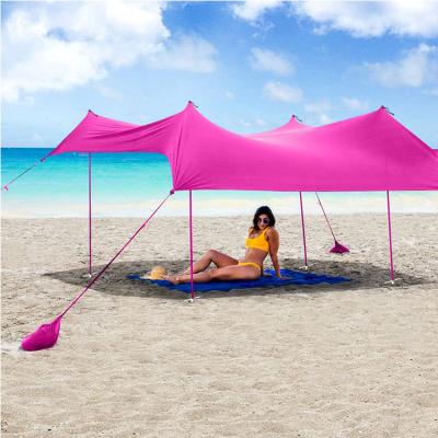 China UPF50 protection beach waterproof UV shelter tent, custom logo fashion beach sun shade coloful for sale