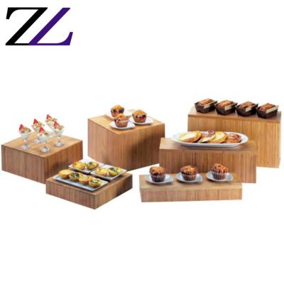 China Customized LOGO and Modern Banquet Food Display Decorative Wood Carved Buffet Elevations Riser for Wooden Buffet for sale