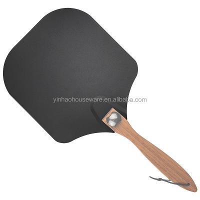 China Unviable popular stick design pizza skin coating shovel with folding wooden handle for sale