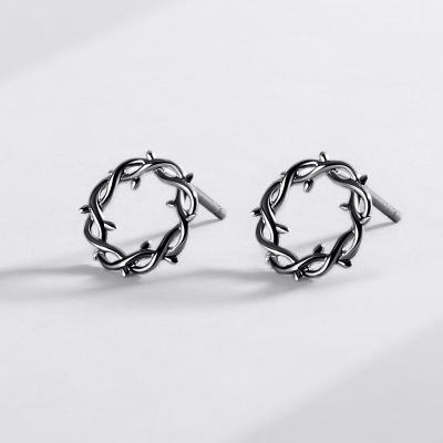 China Fashionable Black Plated Stud Earrings Punk Twist Thorn Winding Circle Earrings Personality Retro for sale