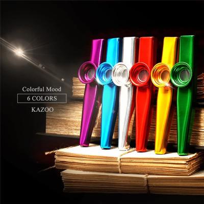 China Professional Wholesale High Quality Custom Logo Groove Funny Colorful Metal Musical Instruments Flutes Kazoo For Kids for sale