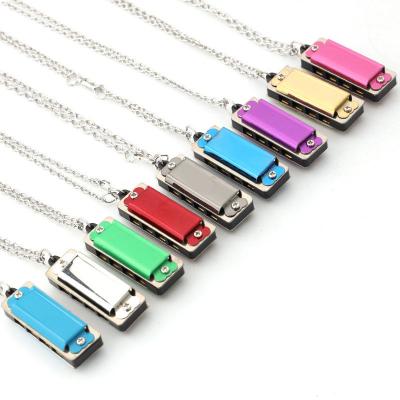 China Toy/Study/Gift Customize Logo Musical Instrument Toy Mini Harmonica Kids From China for sale