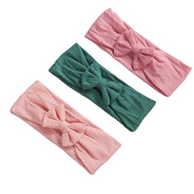 China 2021 Casual Children's Jewelry Printed and Dyed Handmade Mini Bow Dragon Elastic Baby Headband for sale