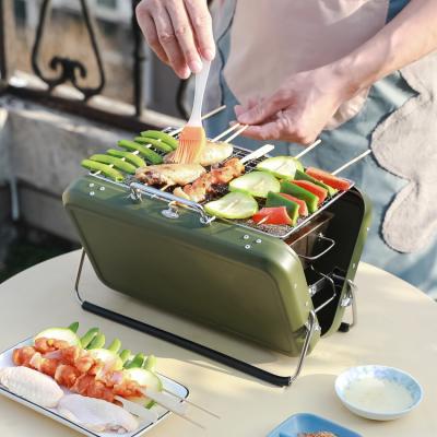 China Easily Assembled Mini BBQ Grill Charcoal BBQ Folding Grill Portable Outdoor Camping Briefcase Custom Style for sale